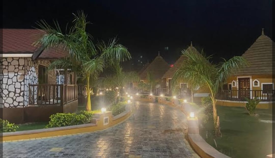 Lion's Cave Resort entrance at night